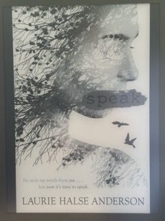 "Cover of the book 'Speak' by Laurie Halse Anderson, featuring a black and white artistic portrait of a young woman's face partially obscured by textural elements. This acclaimed young adult novel explores themes of trauma, recovery, and finding one's voice, often resonating with readers who have experienced selective mutism or other communication challenges following difficult experiences." The book "Speak" is particularly relevant to discussions of selective mutism as it portrays a teenage protagonist who becomes unable to speak after a traumatic event, illustrating how psychological trauma can manifest as communication difficulties.