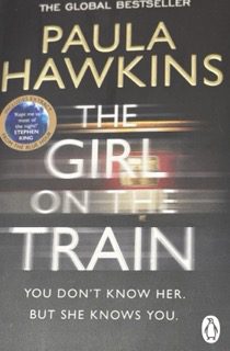 Cover of The Girl on the Train by Paula Hawkins, featuring blurred train motion and the tagline "You don't know her. But she knows you." The image relates to the character Rachel Watson, whose portrayal in the novel has sparked discussions about undiagnosed mental health conditions, including ADHD.